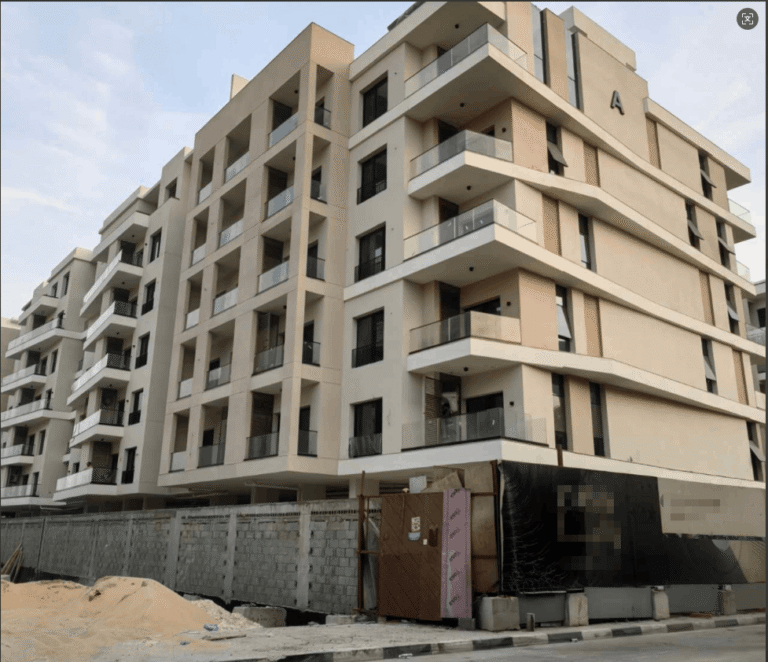 Exterior view of a Dammam apartment building for a 169-set custom cabinets project.